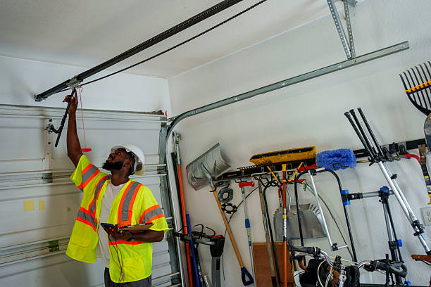 Professional Garage Door Panel Replacement technician working in Earlville, IL